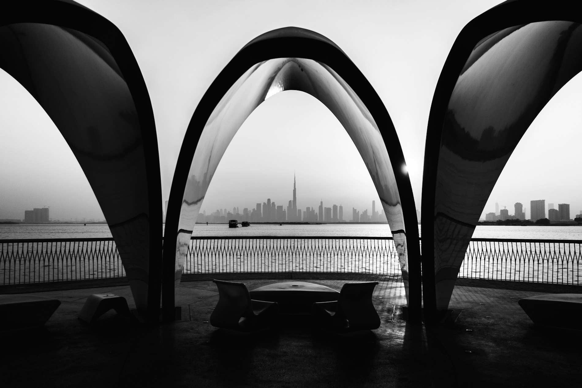 Dubai skyline framed by sculptural arches